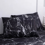 taie d'oreiller en tissu impermeable noir et blanc a motif